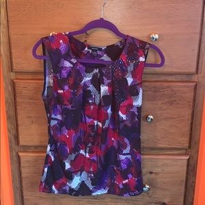 Alfani sequenced like sleeveless blouse.